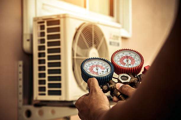 Professional Air Conditioning Service technician working in Lawndale, NC